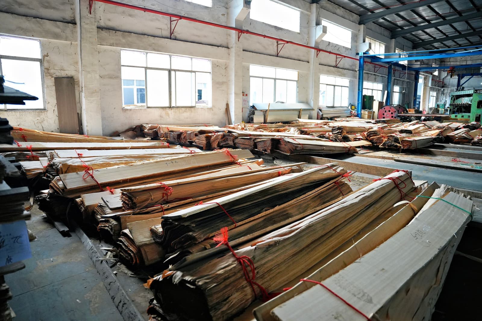 Tagged veneer bundles stacked in the warehouse